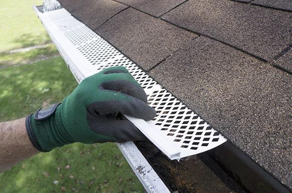 there are various types of gutter guards, including mesh, bottle brush, and reverse curve, each designed to keep debris out of the gutters